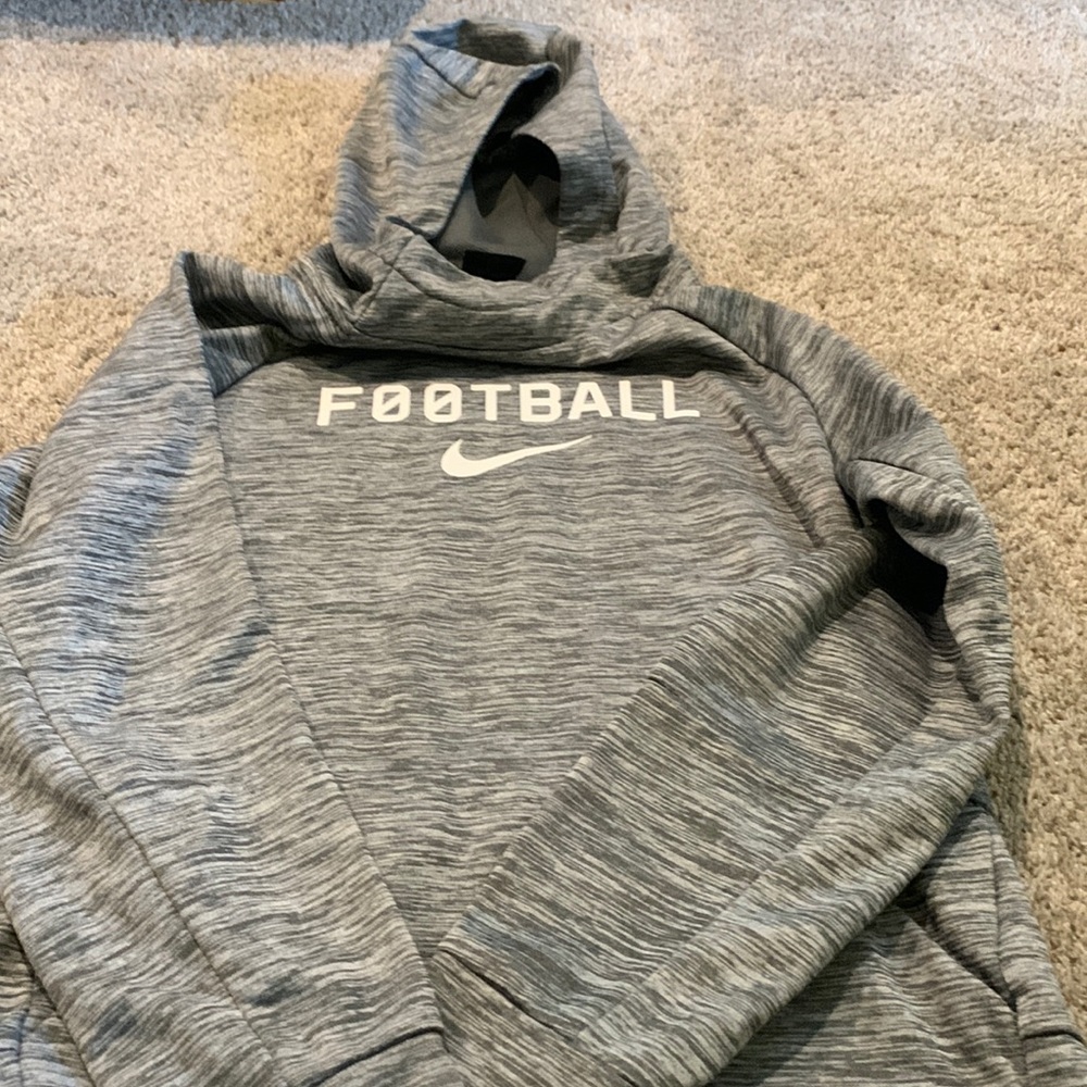 Excellent condition Nike boys large sweatshirt. Black and white “Football”